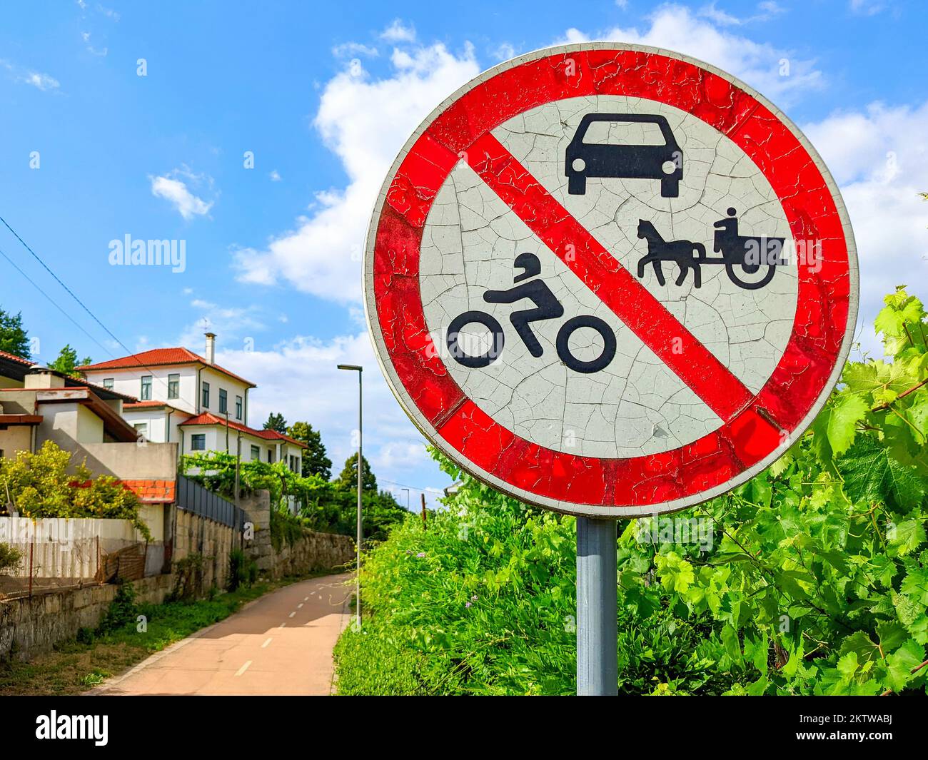 Prohibition sign, cars, motorcycles or horse cart are not allowed to pass. Village and wineyards, privat area. Portugal Stock Photo