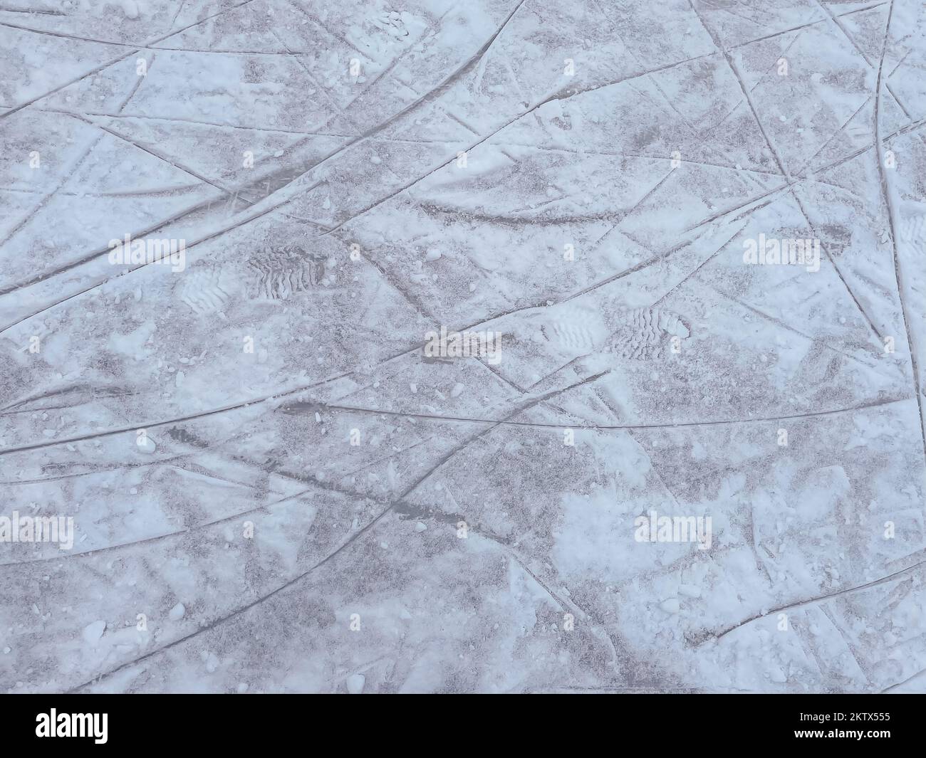 Ice background with marks from skating and hockey. Ice hockey rink ...