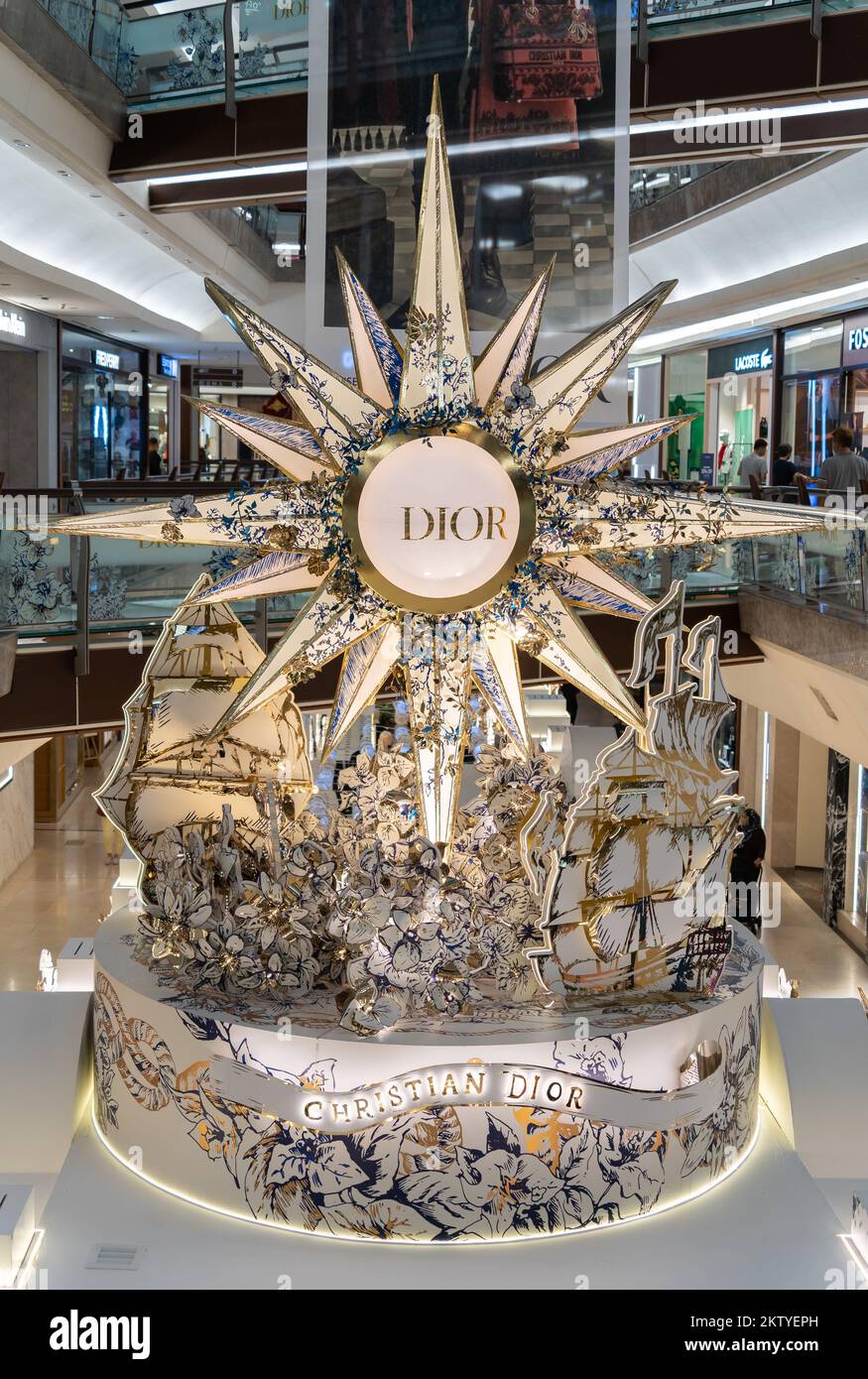 Kuala Lumpur,Malaysia - November 30,2022 : Beautiful Dior Christmas decoration in The Gardens Mall. People can seen exploring and shopping around it. Stock Photo