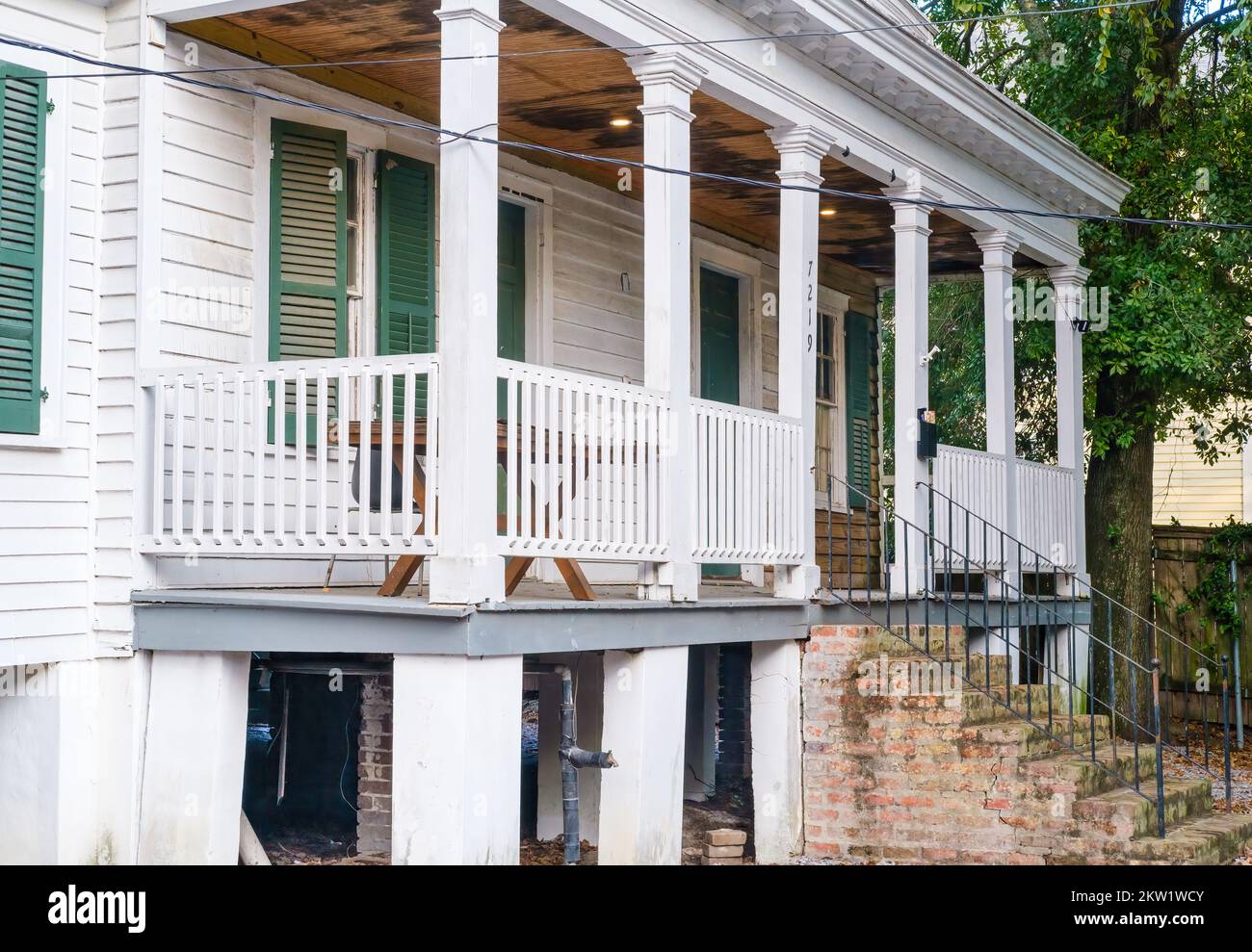 NEW ORLEANS, LA, USA - NOVEMBER 21, 2022: Front of historic Greek Revival Home on Burthe Street Stock Photo