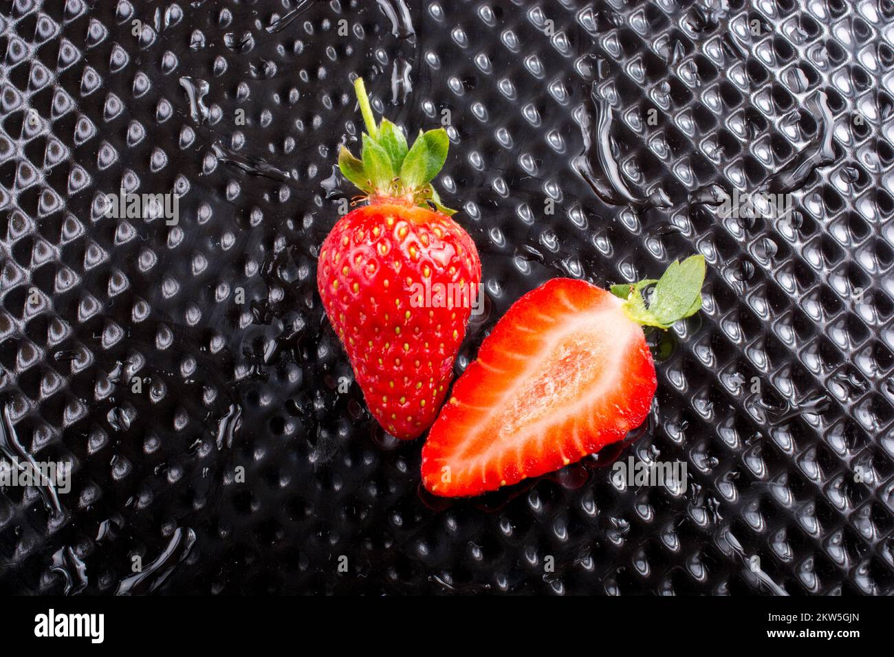 A view of a juicy, sweet and ripe strawberry fruit Stock Photo - Alamy