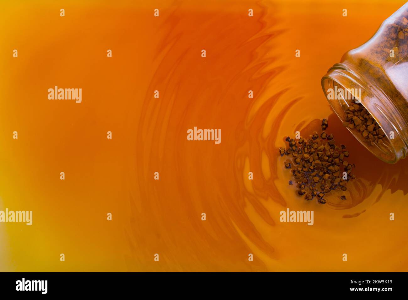 Coffe slowly dissolve in the hot water Stock Photo Alamy