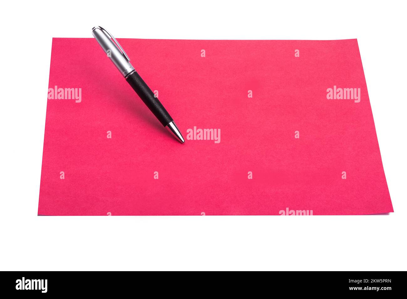 Pen and plain color paper on an isolated background Stock Photo