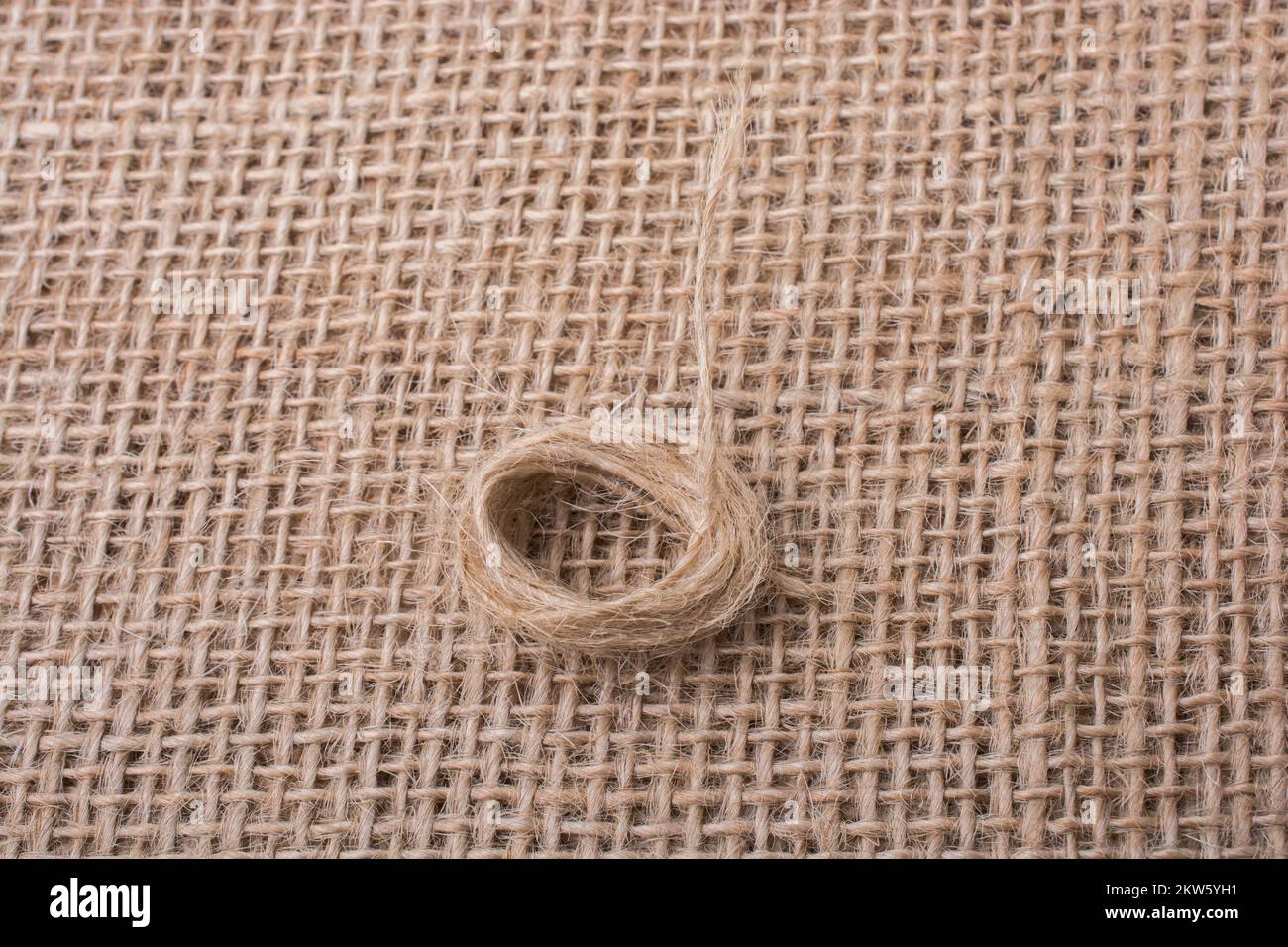 Paper String Background Roll of brown color linen string paper background Stock Photo - Alamy