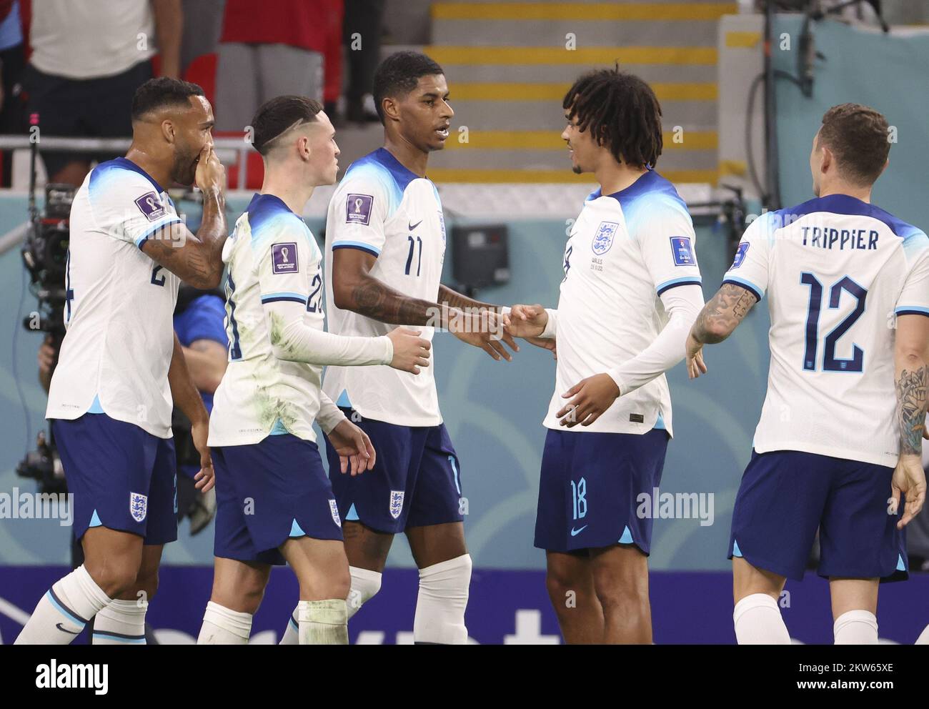 Marcus Rashford of England celebrates his goal with teammates during the FIFA World Cup 2022, Group B football match between Wales and England on November 29, 2022 at Ahmad Bin Ali Stadium in Ar-Rayyan, Qatar - Photo: Jean Catuffe/DPPI/LiveMedia Stock Photo