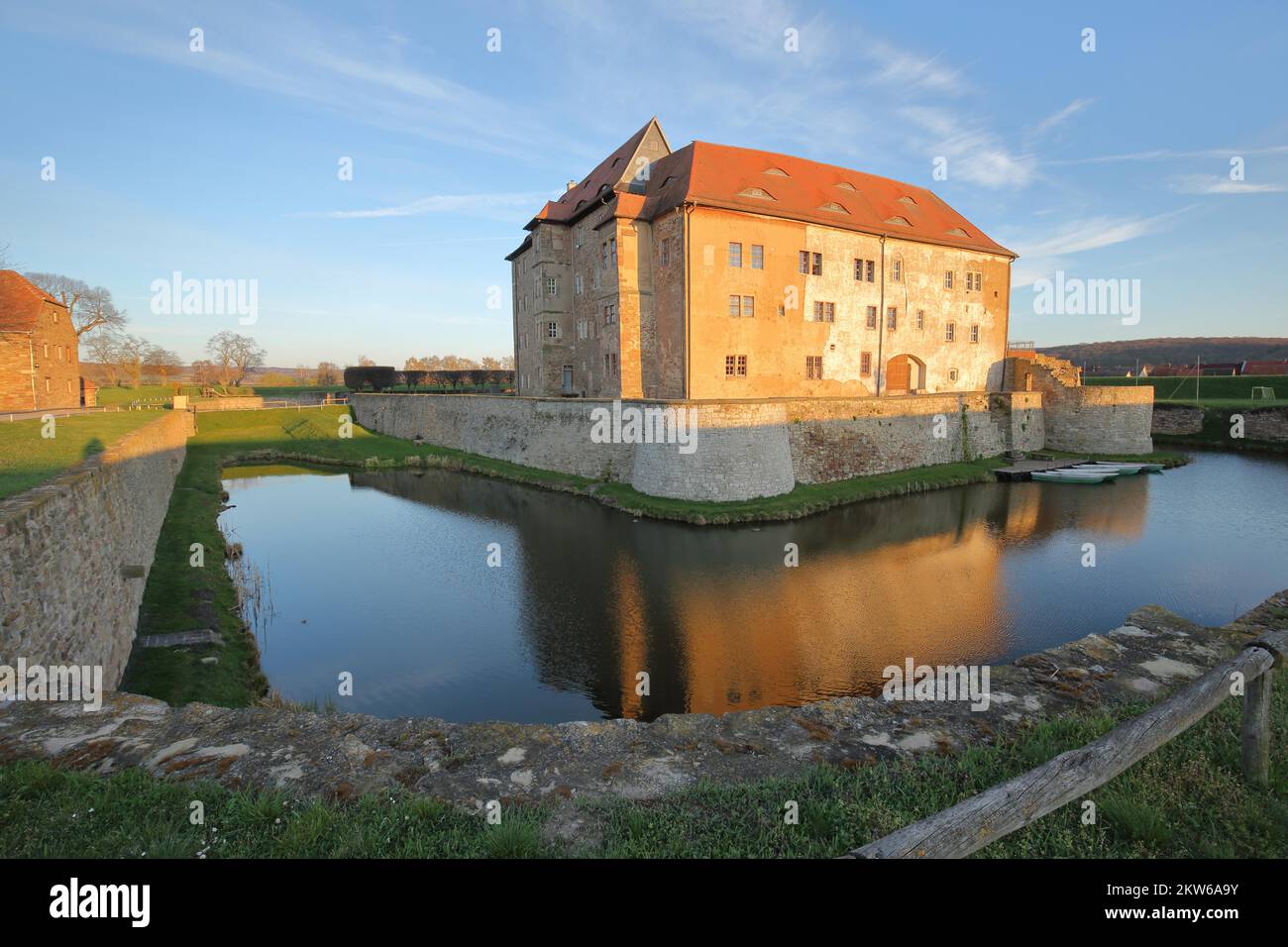 Renaissance moated castle with reflection in the pond, castle, fortress ...