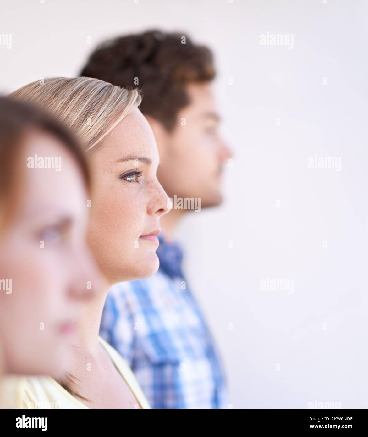Three young women in row hi-res stock photography and images - Alamy