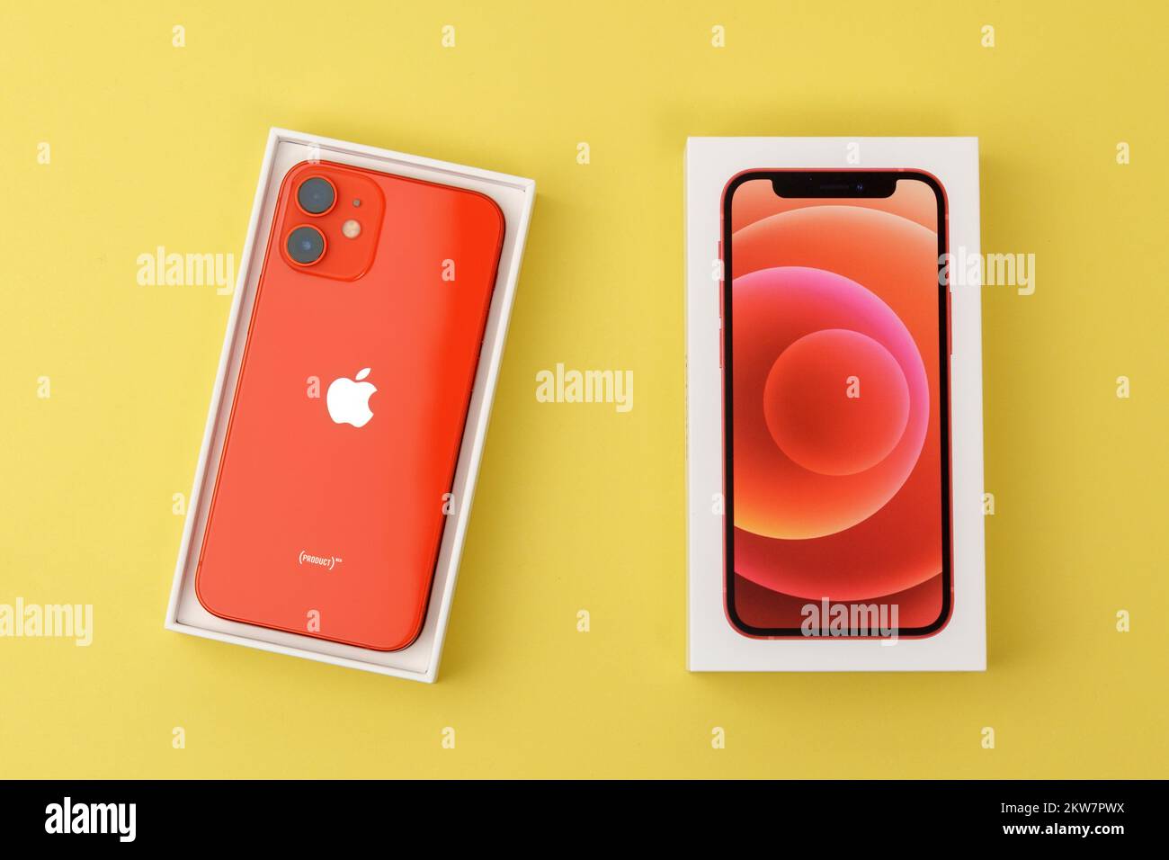Tyumen, Russia-July 18, 2022: iPhone 12 mini product red. This mobile phone records 4k video in Dolby Atmos HDR Stock Photo