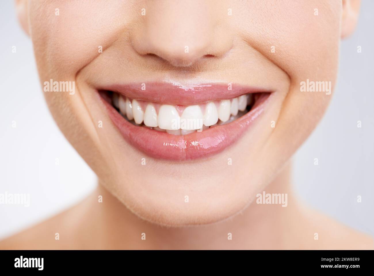Showing off her million dollar smile. Macro image of a stunning womans