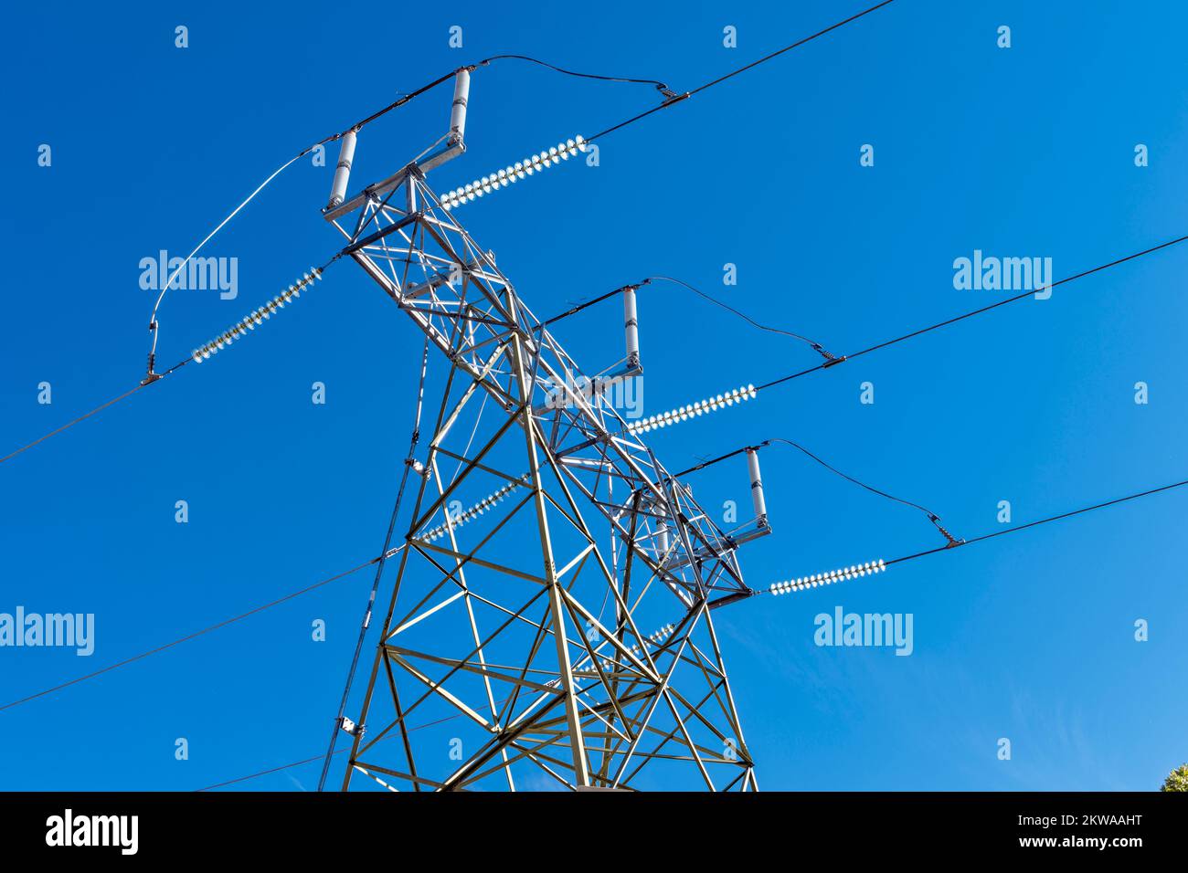 Top of a high tension electrical transmission tower with glass