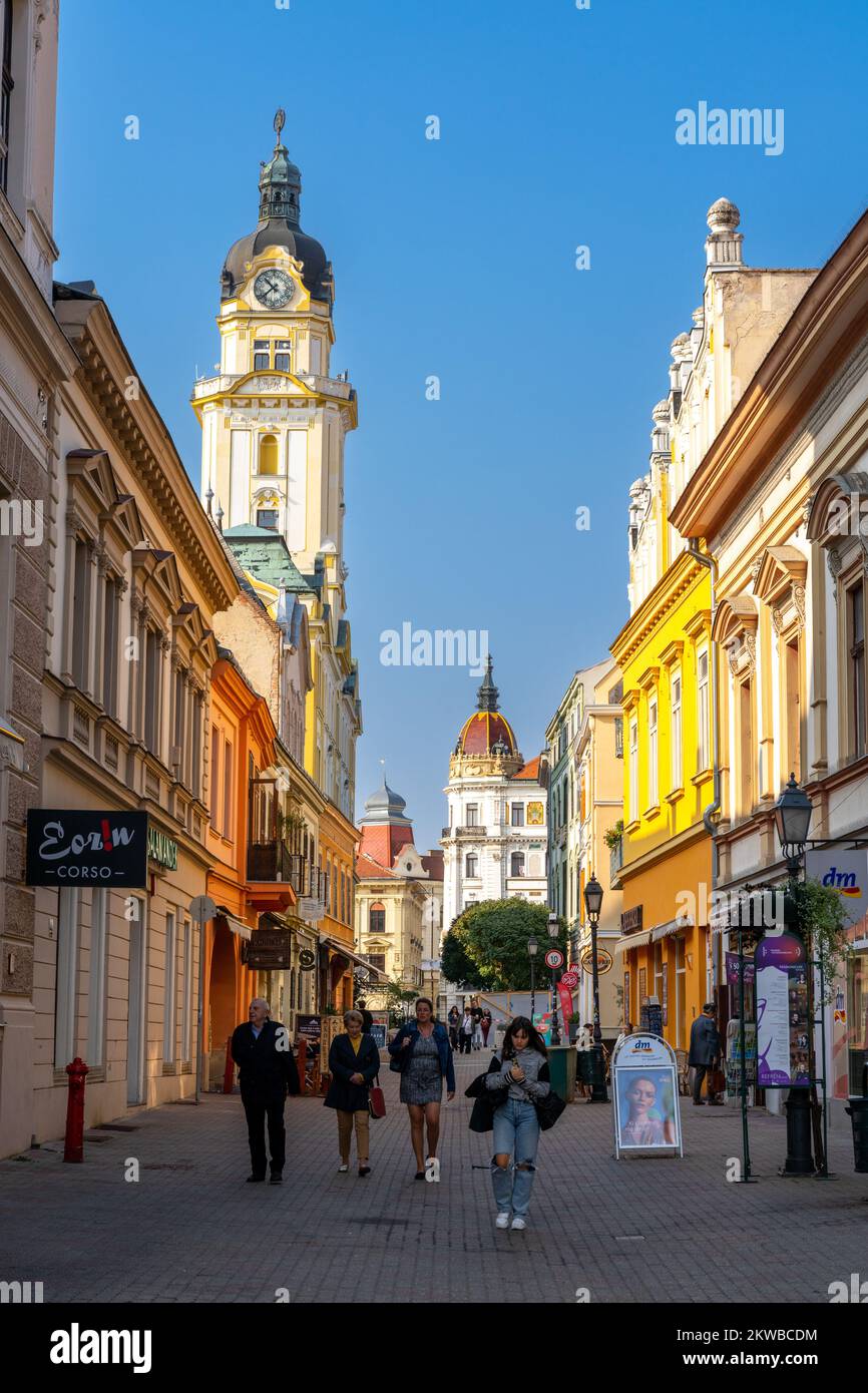Pecs, Hungary 13 October, 2022 people walking along a cobblestone