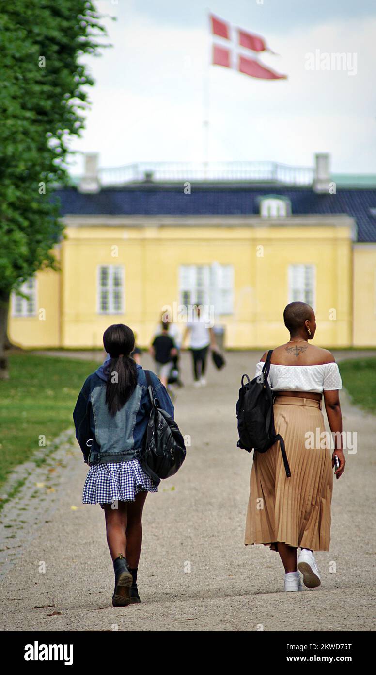Woman in short skirt walking hi-res stock photography and images - Alamy