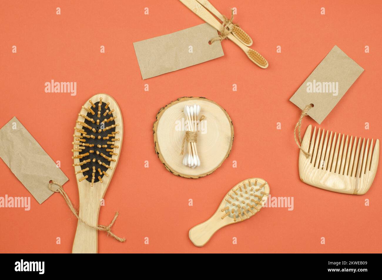 Cotton buds on a wooden podium. Personal care products made from
