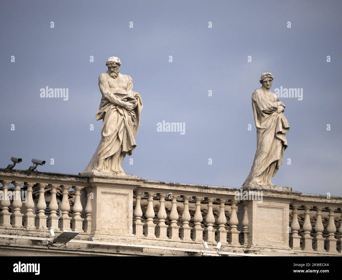 saint peter basilica rome detail of statue on columns roof Stock Photo