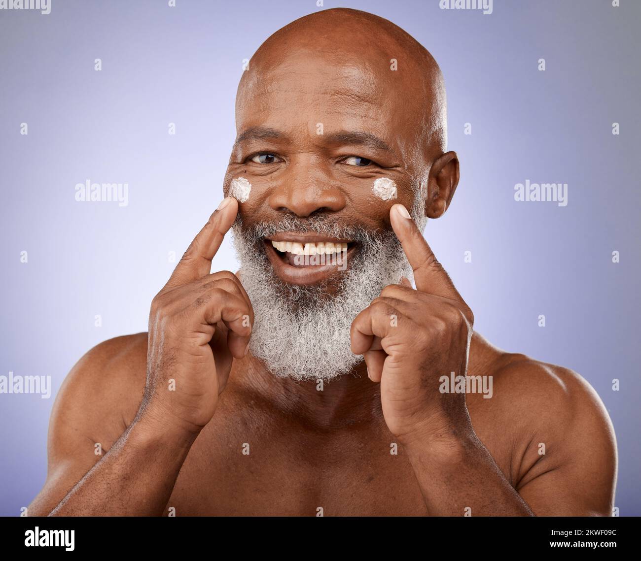 Portrait, skincare and senior black man with face cream in studio on