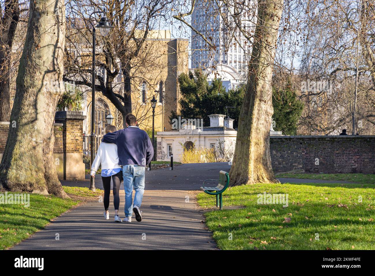 Couple walking together, London Park, London, England Stock Photo