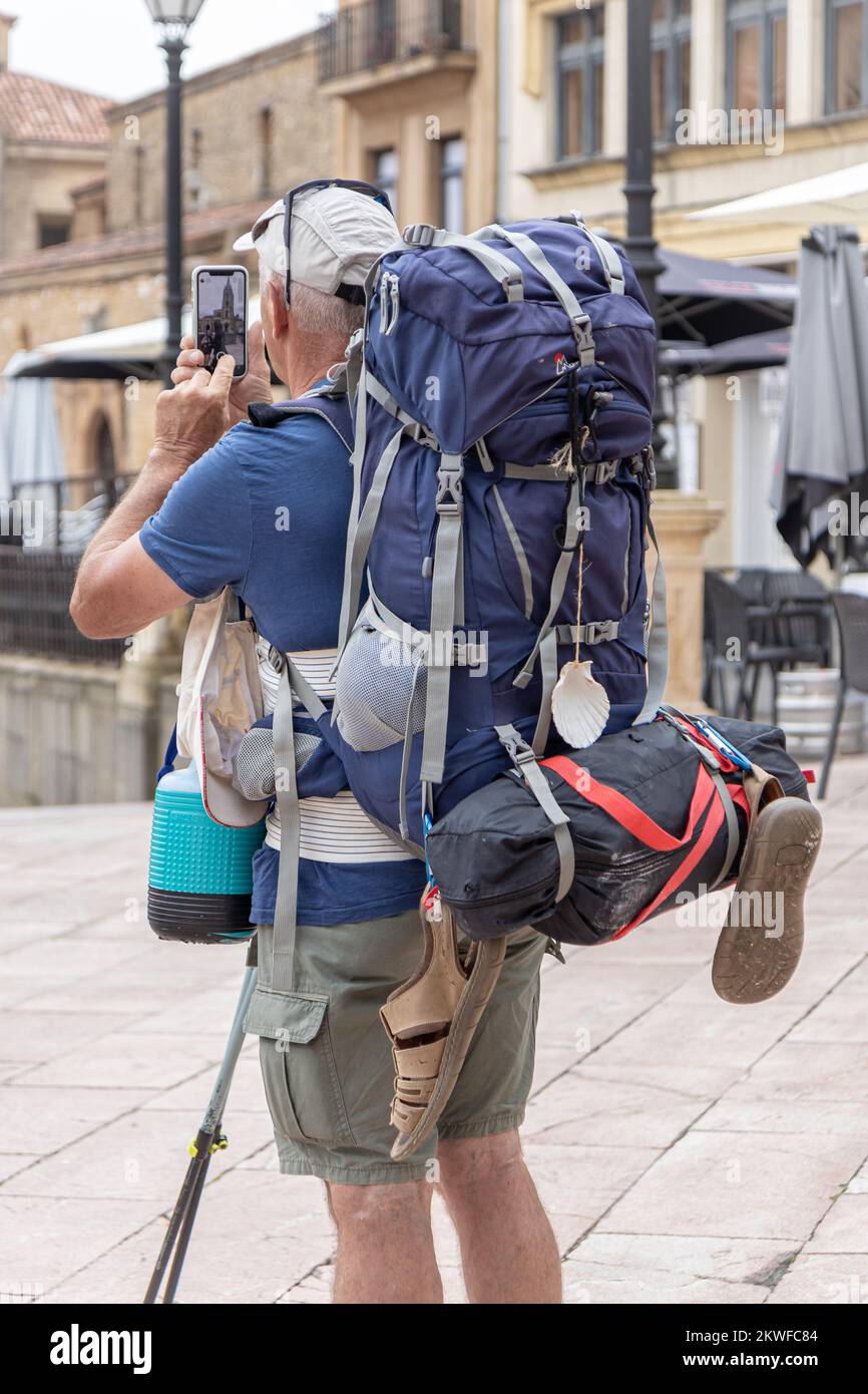 OVIEDO, SPAIN-AUGUST 10, 2021: Typical pilgrim of Camino de Santiago (Way of St James) Stock Photo