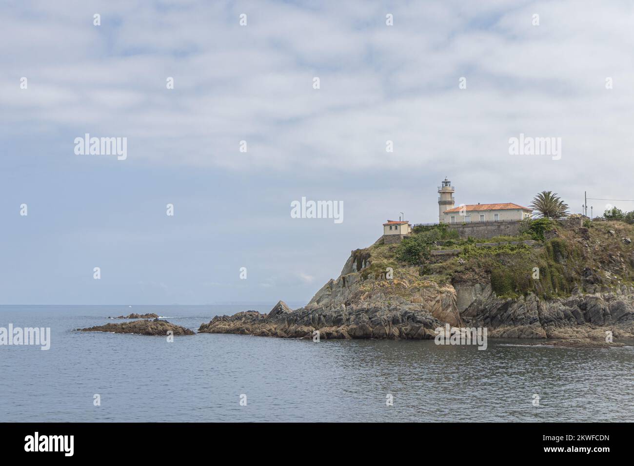 Faro de Cudillero (Lighthouse de Cudillero), Cudillero village (AKA Pixueto), Asturias, Spain Stock Photo