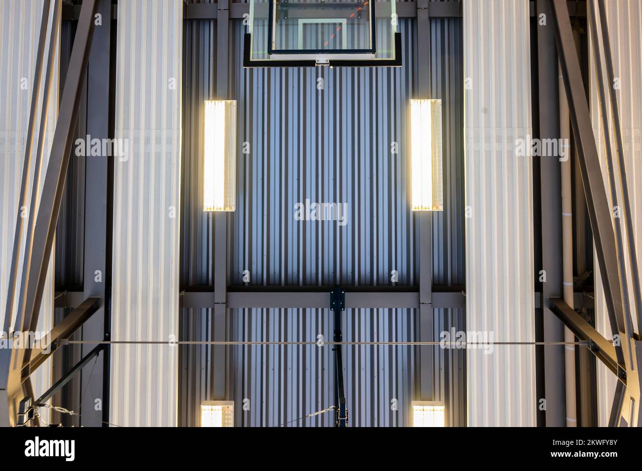 Modern hall ceiling of a sports hall with lighting and a ceiling radiant heating system Stock Photo