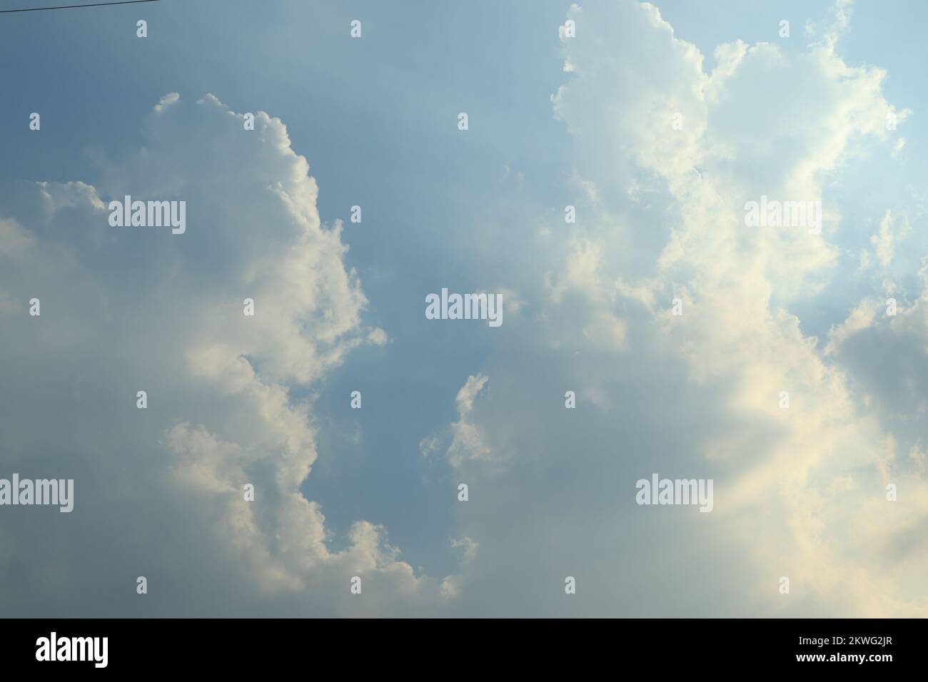 Light blue sky with clouds Stock Photo