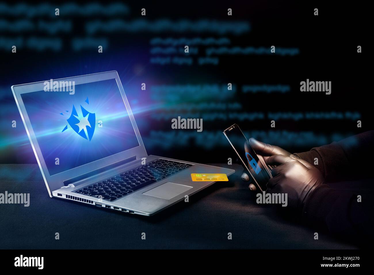 A cybercriminal scamming online through his cell phone. Phishing danger. Security system unlocked by a hacker Stock Photo