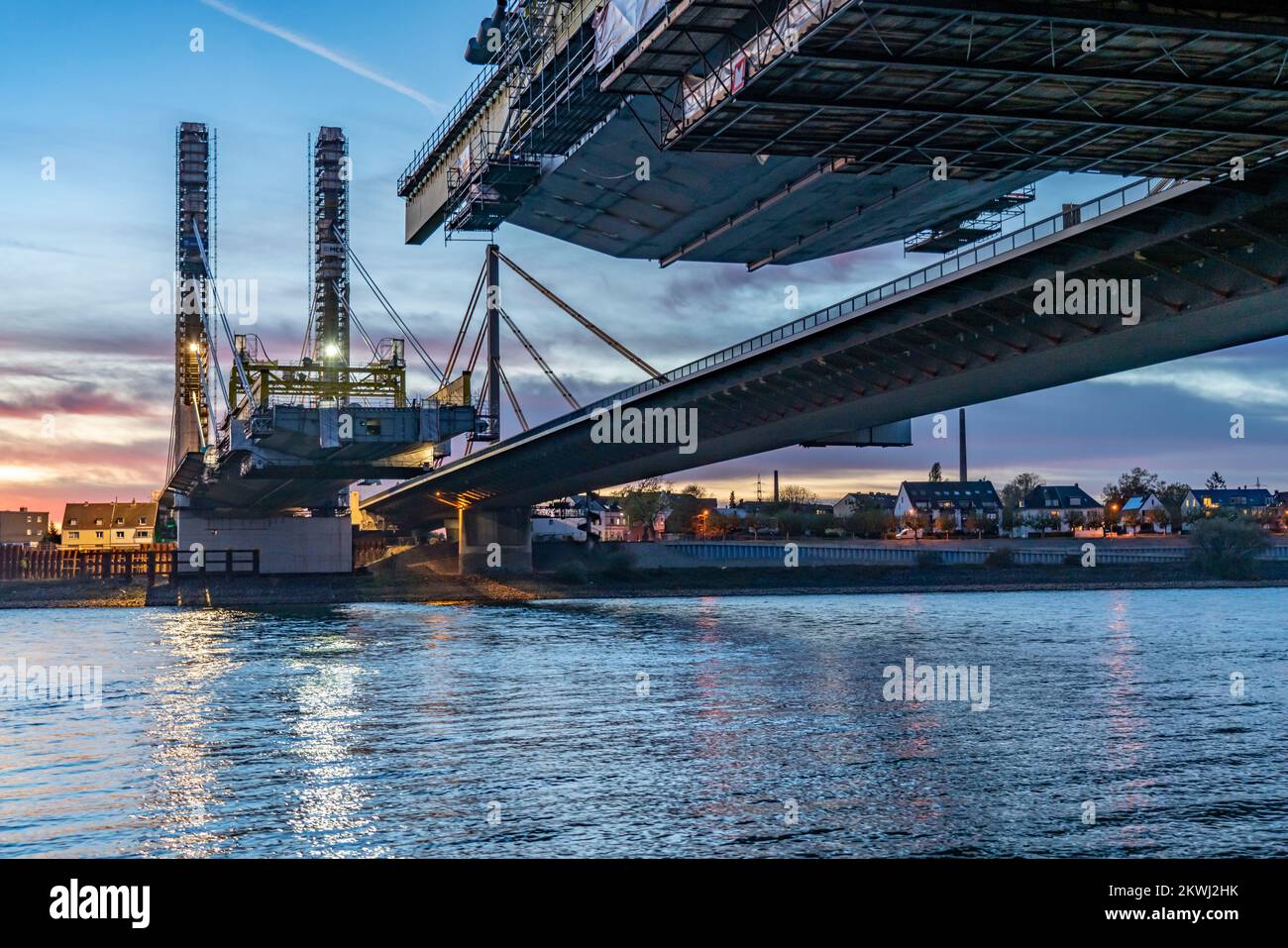 New construction of the Neuenkamp motorway bridge on the A40, over the Rhine near Duisburg, evening construction work, free cantilever assembly of the Stock Photo