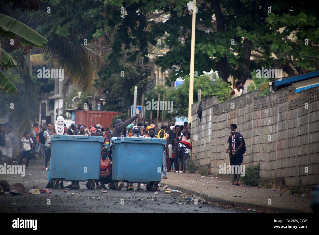In Doujani neighborhood in Mamoudzou, following a vast arrest operation of illegal migrants and after two days of road blocade and buses attacks, rioters with the help of young inhabitants of the quarter scuffle with police forces. Seeing that the police couldn't cope with the violence of the crowd, motorist decided to enter the scene and throw stones back to the rioters, on September 2 2020 in Mayotte, France. Photo by Gregoire Merot/ABACAPRESS.COM Stock Photo