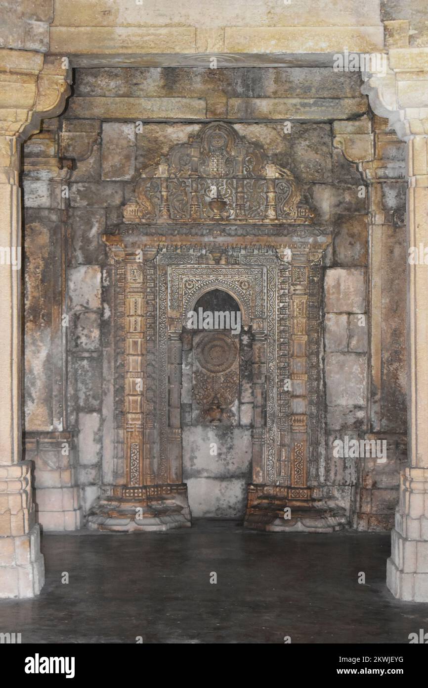 Shaher ki Masjid, Masjid side panel with Stone carvings works on wall pillars, built by Sultan Mahmud Begada 15th - 16th century. A UNESCO World Herit Stock Photo