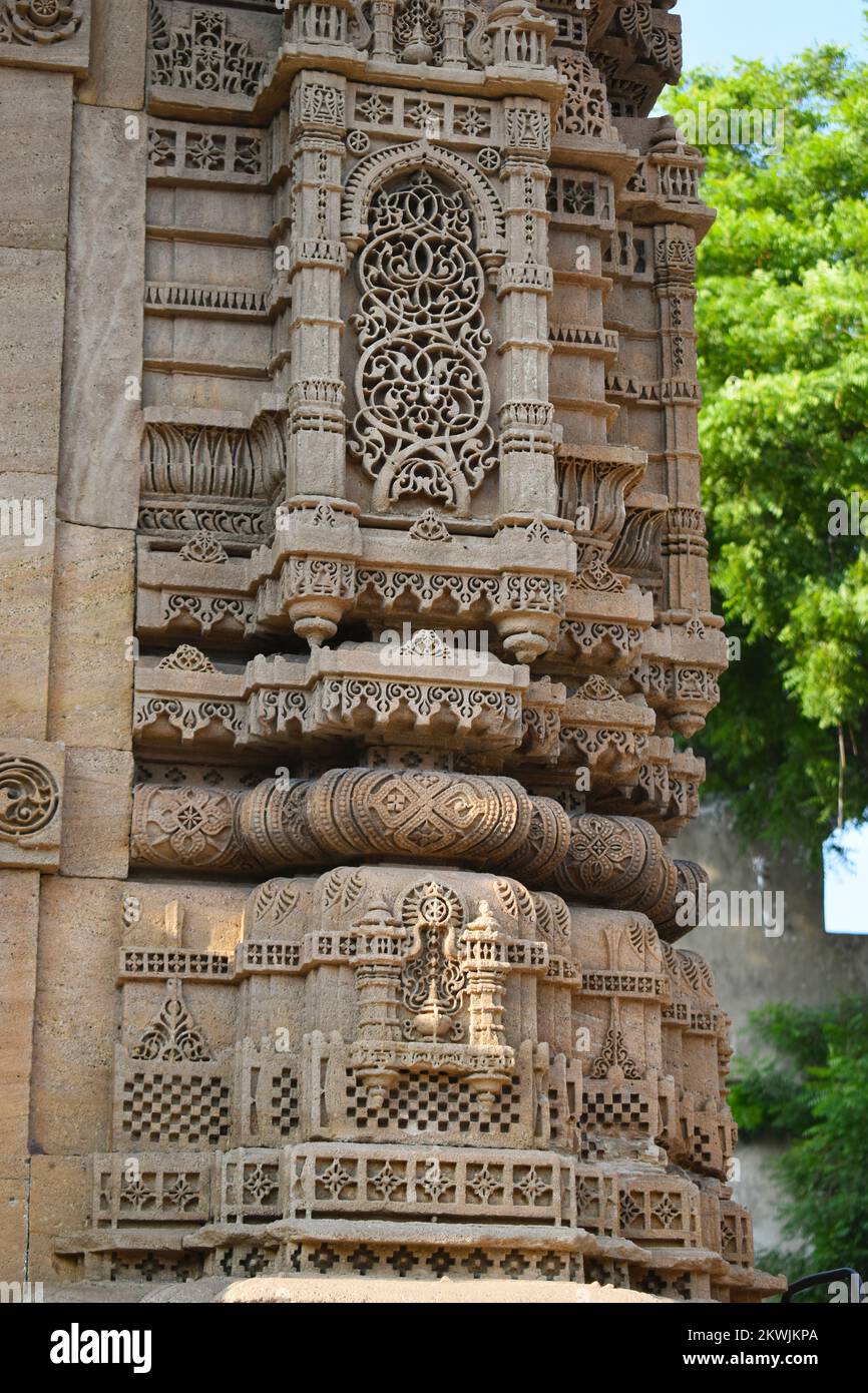 Rani Sipri's Mosque also known as Rani Sipri ni Masjid or Masjid-e-nagina, exterior Minaret stone carving details, left view, Islamic architecture, Bu Stock Photo