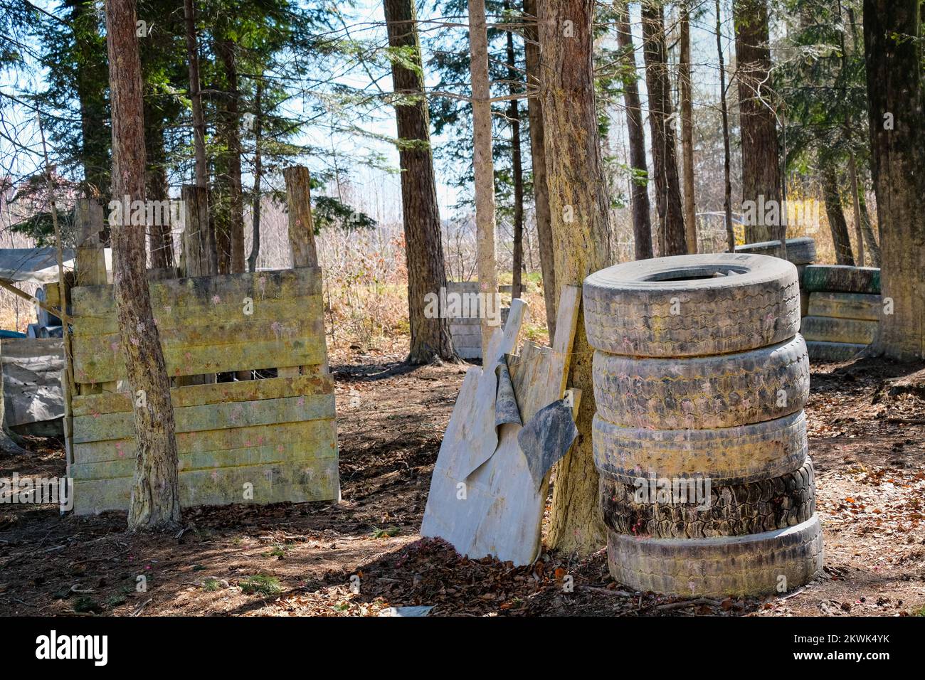 Arena for paintball sports. Fortification in the forest among walls