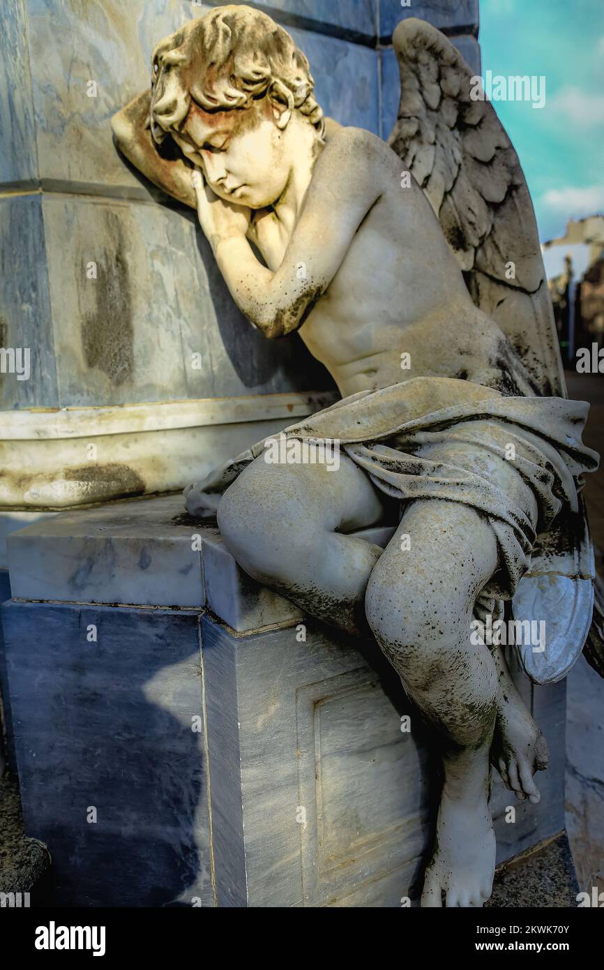 Young sad and beautiful fragile Angel, Recoleta cemetery, Buenos Aires Stock Photo