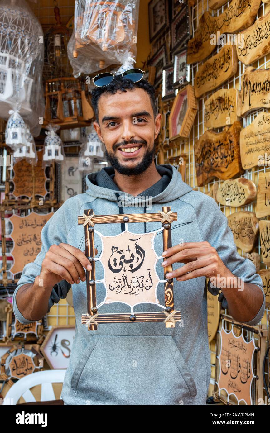 Portrait of a Tunisian young man in his gift shop in Hammamet. Tunisia