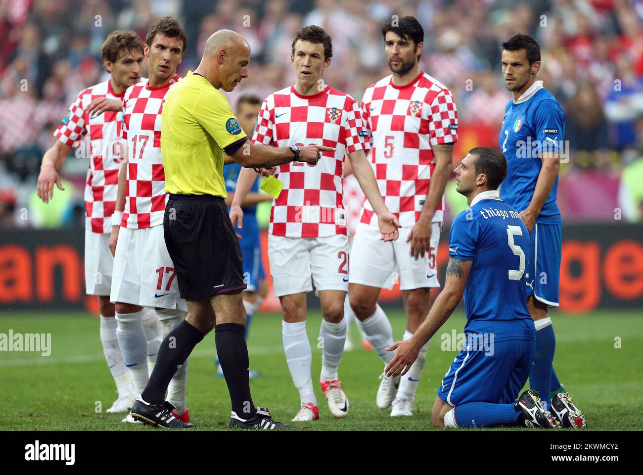 14.06.2012., Poznanj, Poland - UEFA Euro 2012, group C, Italy - Croatia. Mario Mandzukic, Ivan Strinic, Vedran Corluka, Howard Webb, Thiago Motta.  Photo: Slavko Midzor/PIXSELL Stock Photo