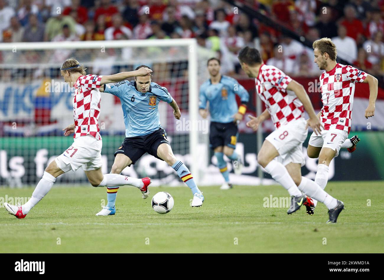 18.06.2012., Gdansk, Poland - UEFA Euro 2012, group C, Croatia - Spain. Ivan Rakitic, Andres Iniesta. Photo: Slavko Midzor/PIXSELL Stock Photo