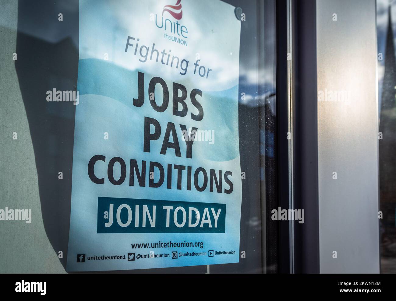 Unite the Union fighting for jobs pay condition join today poster at a Unite branch in Southern England, Hampshire, UK Stock Photo