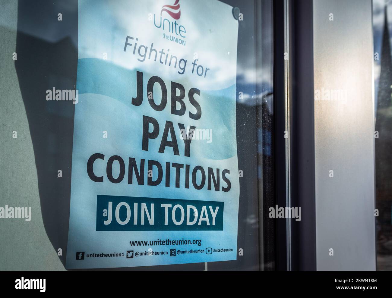 'Unite the Union fighting for jobs pay conditions - join today' poster at a Unite branch in Southern England, Hampshire, UK Stock Photo
