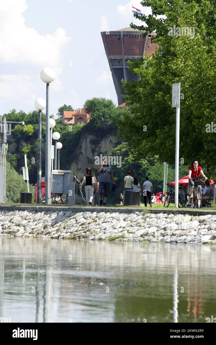 14.06.2013: Vukovar - Water wave that caused massive flooding in Europe came to Vukovar, but well prepared embankments resist the Danube, which is constantly growing. Residents of carefree spending time strolling the sunny city of not allowing the Danube that they spoil the day. Photo: Marko Pavlovic / HaloPix / PIXSELL Stock Photo