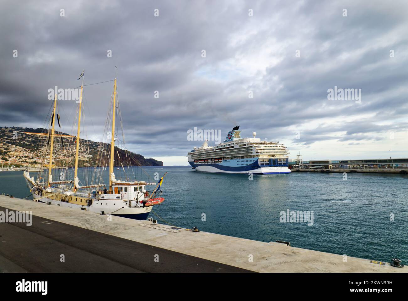 Funchal, Madeira - Cruise ship in Funchal harbour with three masted tall ship in foreground Stock Photo
