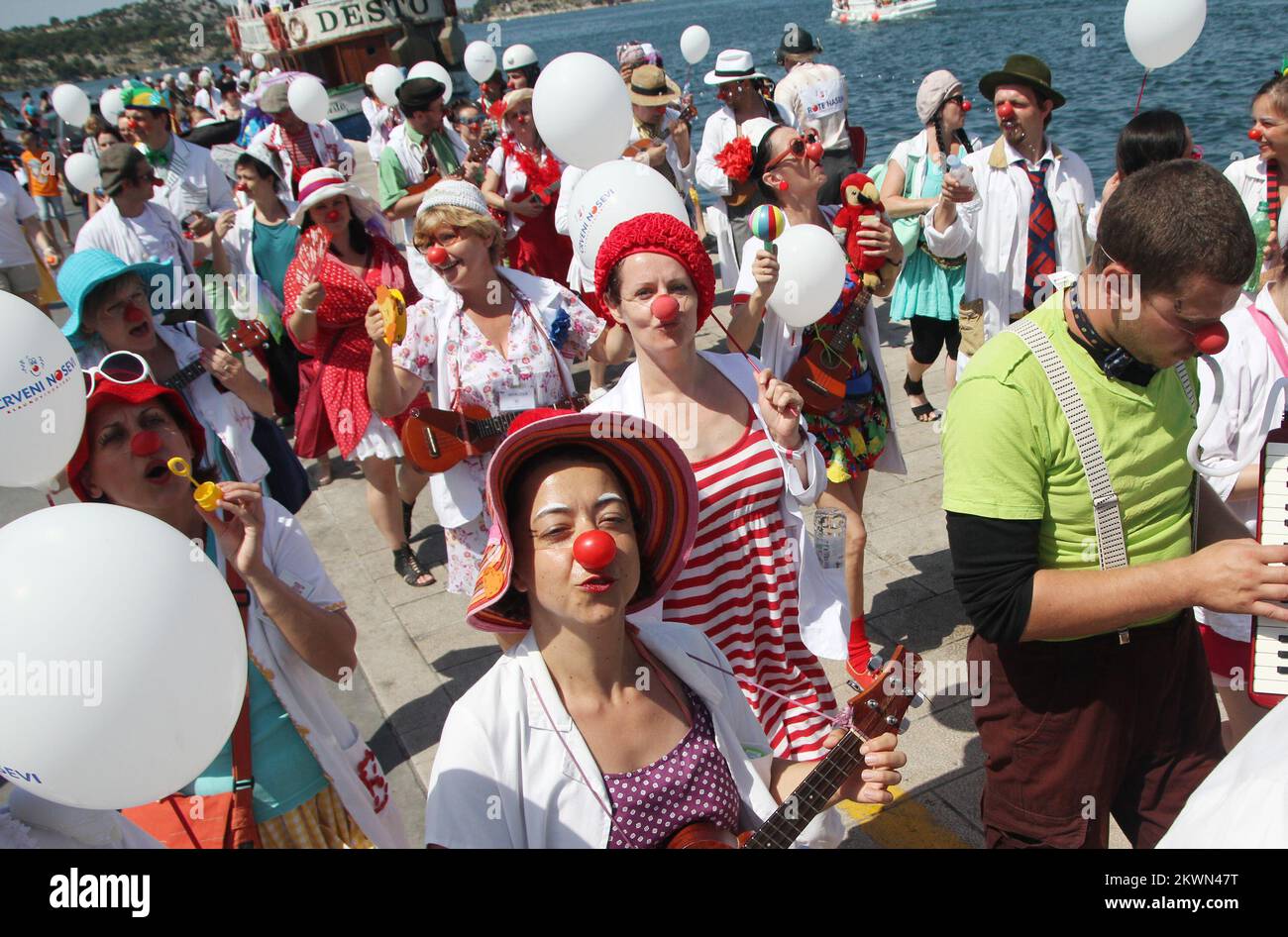 21.06.2013: Sibenik, Croatia: International clown doctor organisation Red noses came to Adriatic coast. They brought music, magic, and lots of fantasy and laughter to children, their parents, citizens and tourists.  Photo: Dusko Jaramaz/PIXSELL Stock Photo