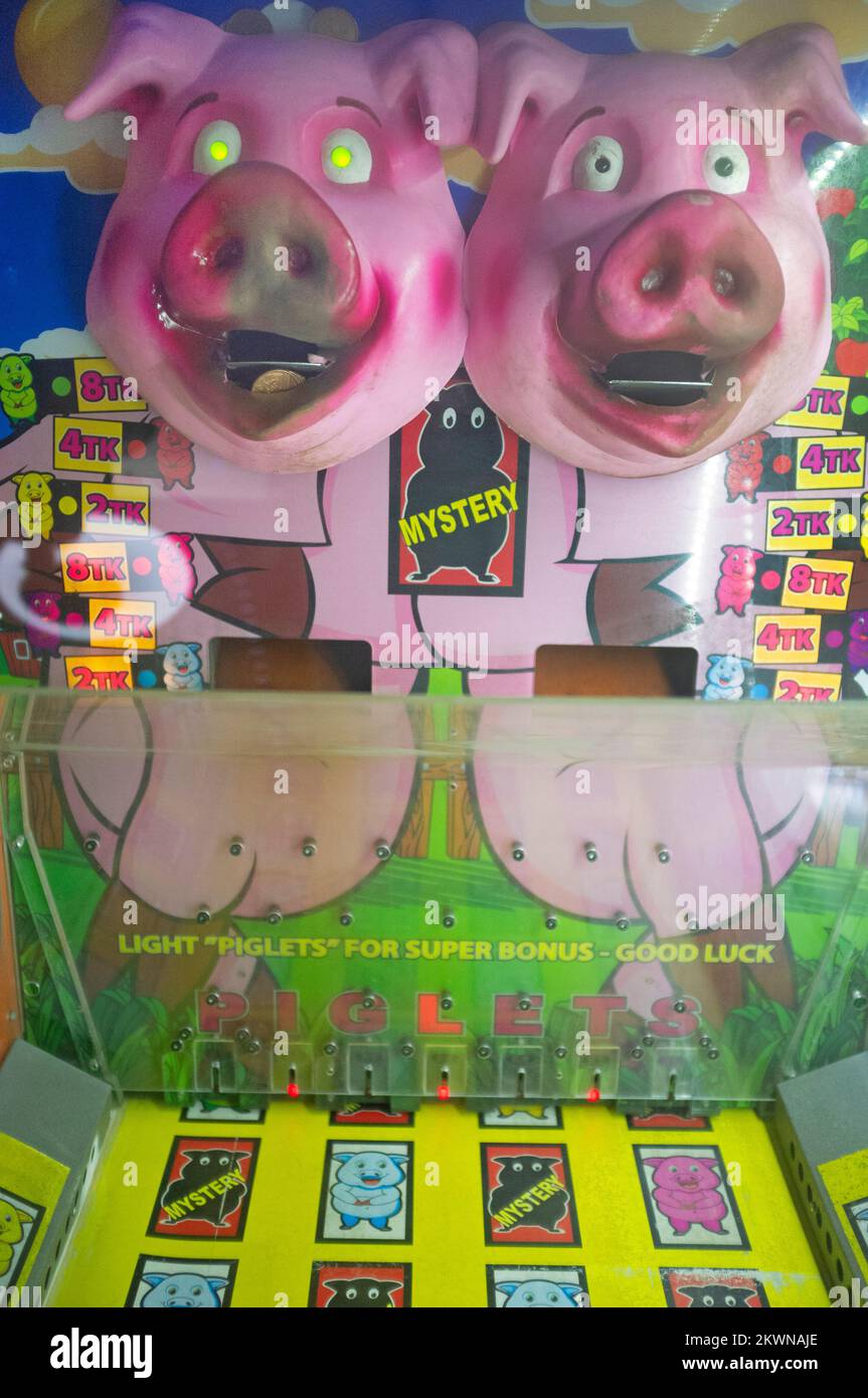 A porcine game on Brighton Pier Stock Photo Alamy