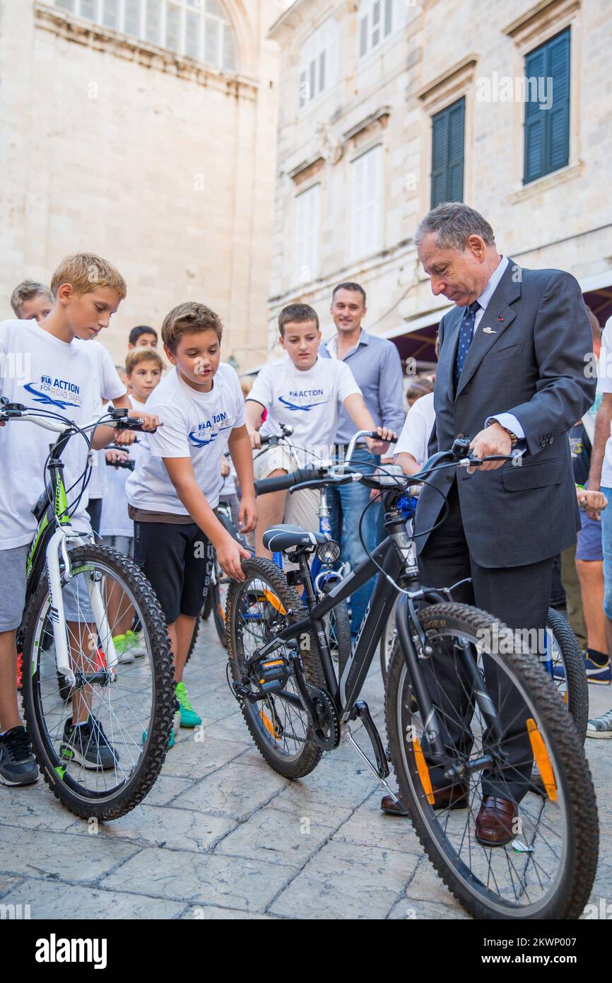In front of the Rector's Palace Jean Todt visited event 'FIA Action for Road Safety.' It was attended by members of the Automobile Club Dubrovnik racing and city kids who competed in the training area on bicycles. The whole operation came as support of president of FIA Jean Todt and the Chairmen of the global automotive organization, as well as Mayor Andro Vlahusic.  Stock Photo