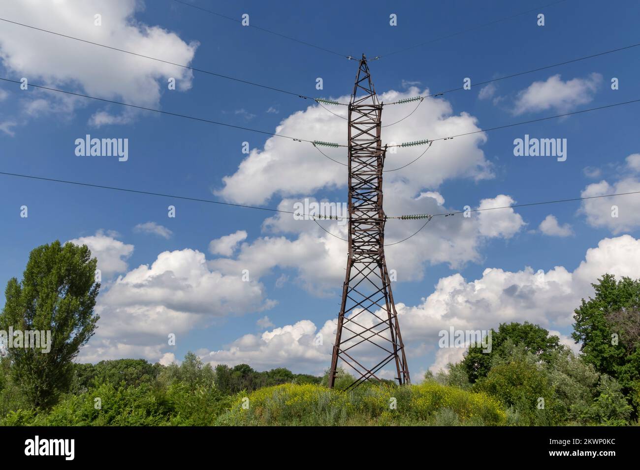 view on electricity pylon against cloudy sky in Ukraine Stock Photo