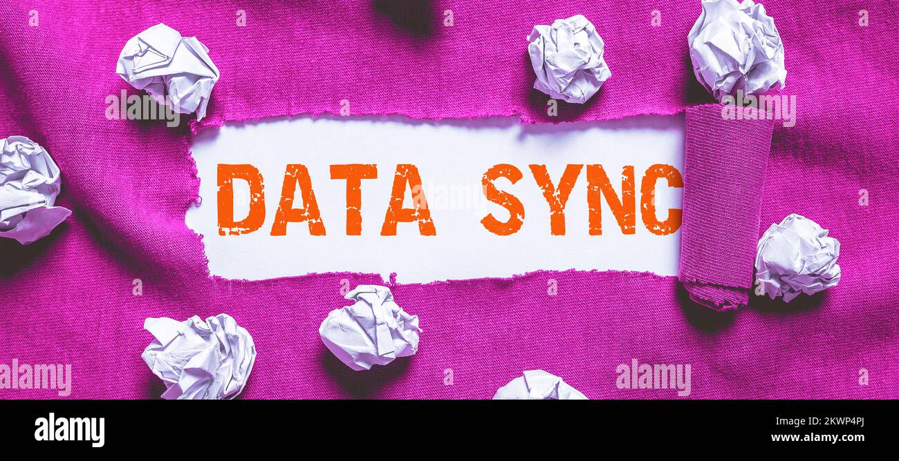 Writing displaying text Data Sync, Business approach data that is continuously generated by different sources Stock Photo