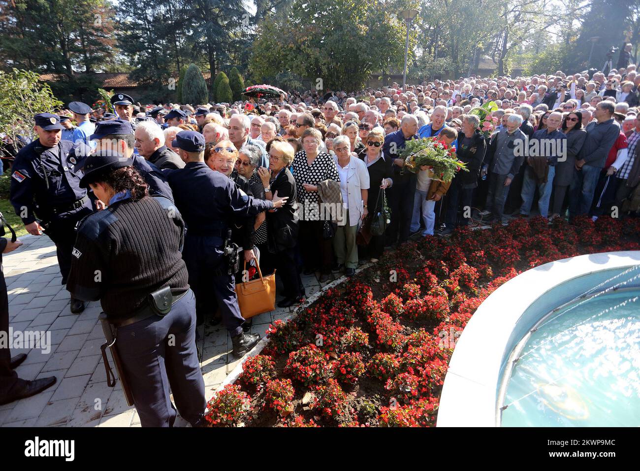 26.10.2013., Belgrade, Serbia - Jovanka Broz, former First Lady of Yugoslavia and Tito's widow, is buried after dying of heart failure earlier this month. Jovanka Broz died of heart failure in a Belgrade hospital on Oct. 20, at the age of 88. Thousands of mourners, many from other former Yugoslav republics, gave Broz a final salute as her coffin, covered with red flowers, was carried into the "House of Flowers" compound where she was buried next to her husband. Photo: Marko Mrkonjic/PIXSELL Stock Photo
