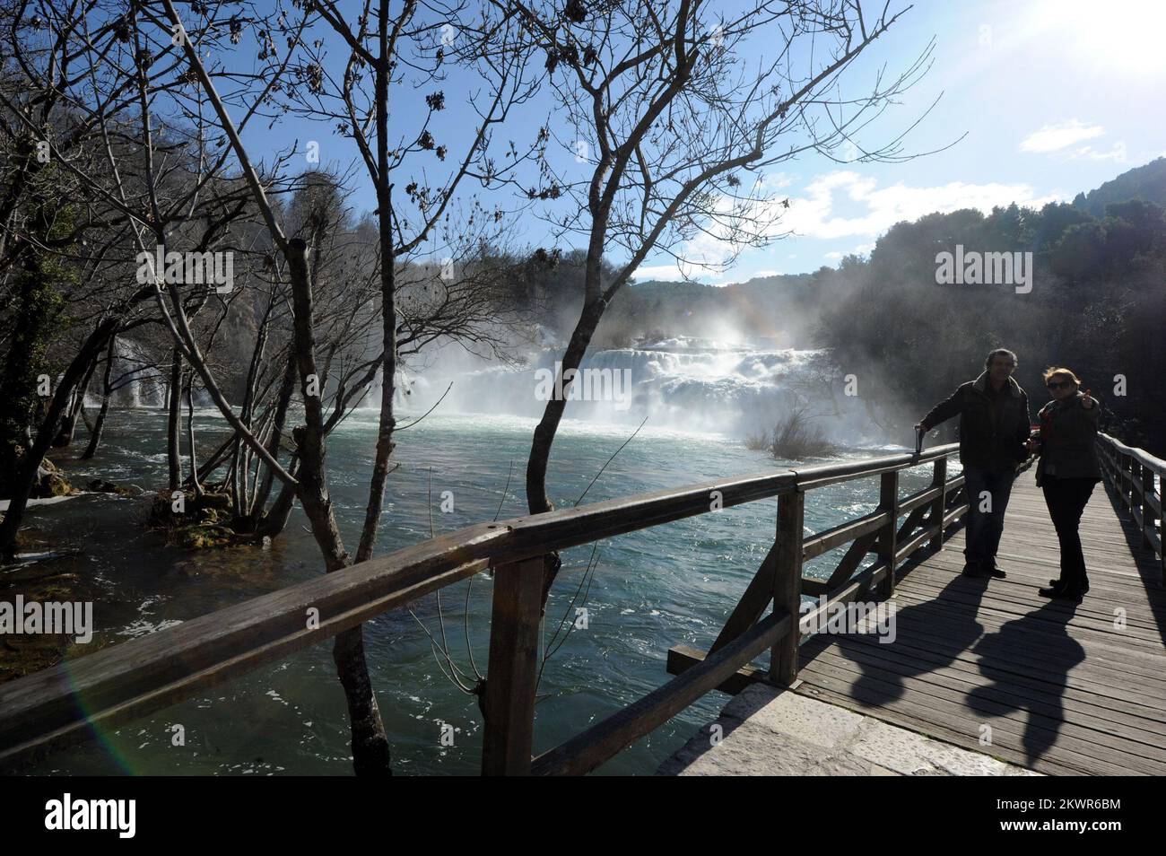 03.02.2014., Slapovi Krke, Croatia - While the majority of Croatia is covered in ice and snow there are rare visitors to enjoy the sun and shadow and swollen waterfalls of Krka. Photo: Hrvoje Jelavic/PIXSELL Stock Photo