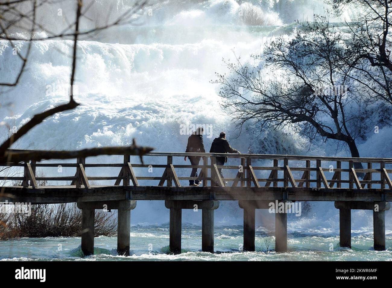 03.02.2014., Slapovi Krke, Croatia - While the majority of Croatia is covered in ice and snow there are rare visitors to enjoy the sun and shadow and swollen waterfalls of Krka. Photo: Hrvoje Jelavic/PIXSELL Stock Photo