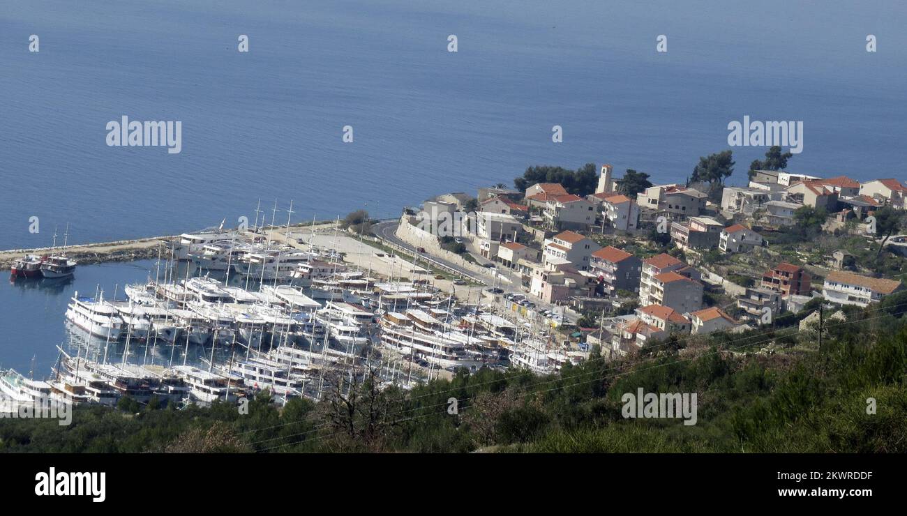 13.03.2014., Krilo Jesenice, Croatia - Shippers using the nice days to prepare boats for this year's season. Port in Krilo Jesenice is a shelter for sailing ships, that every day, more and more are replaced by some new ships. Photo: Ivo Cagalj/PIXSELL Stock Photo