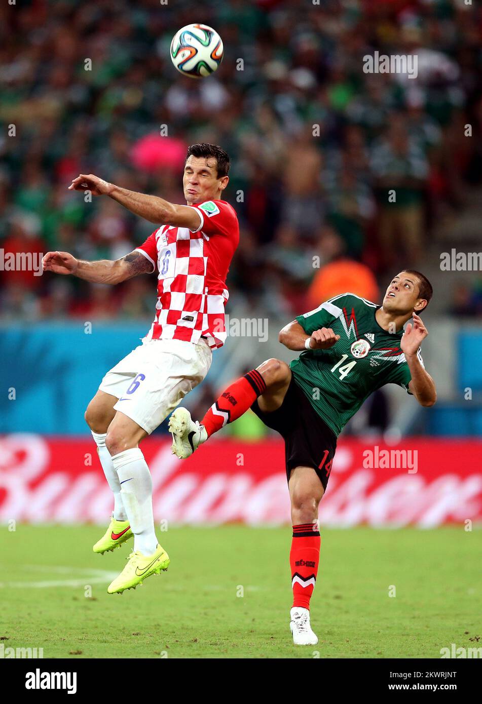 2014 FIFA World Cup group A game against Mexico and Croatia. Dejan Lovren, Javier Hernandez Photo: Sanjin Strukic/PIXSELL Stock Photo