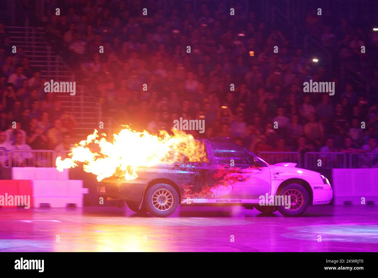 The legendary TV show hosts Jeremy Clarkson, Richard Hammond, James May and the mysterious driver Stig perform a variety of stunts and challenges at Arena Zagreb in spectacular automotive show, Top Gear Live.  Stock Photo