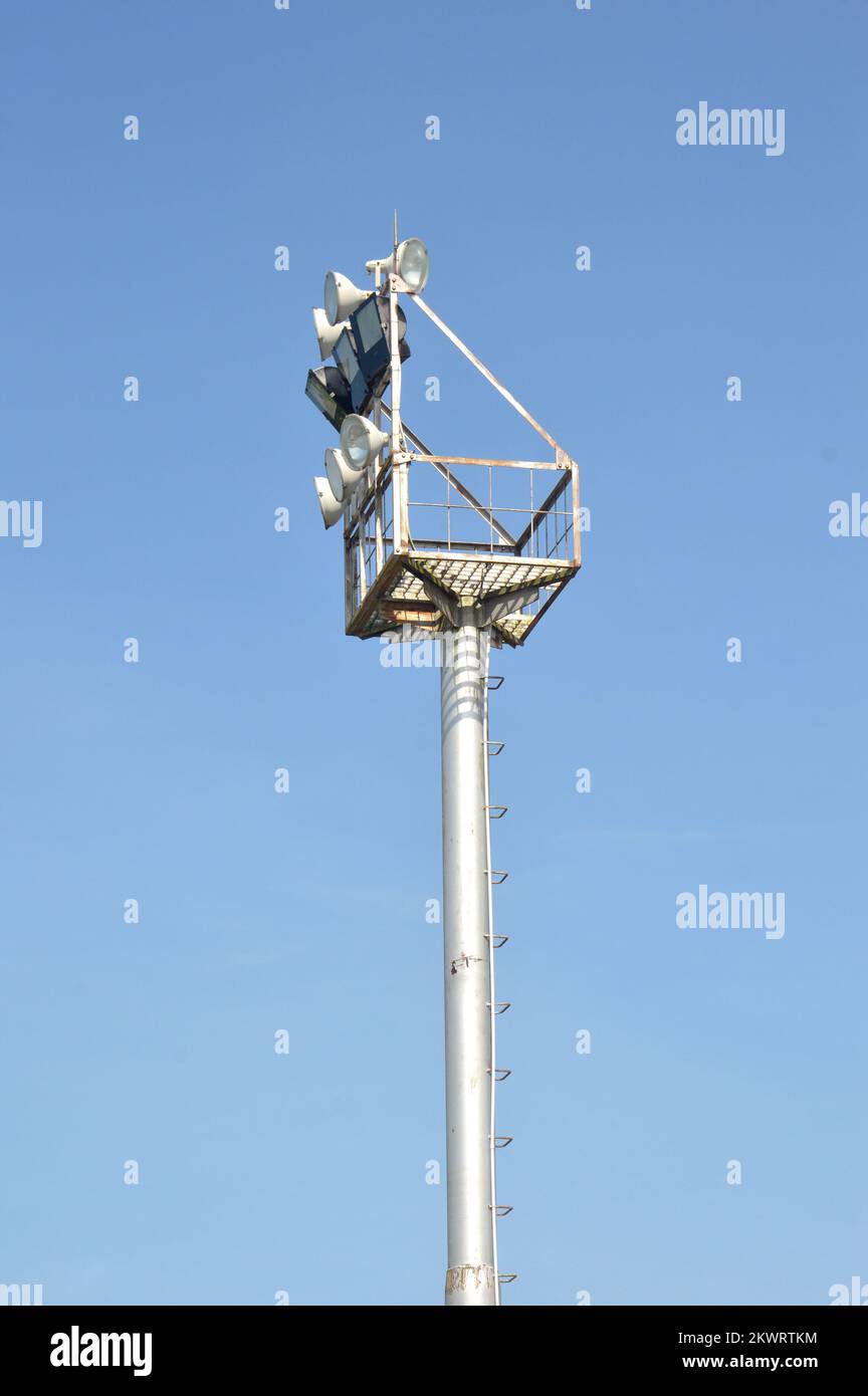 stadium light poles with blue sky backgrounds Stock Photo - Alamy